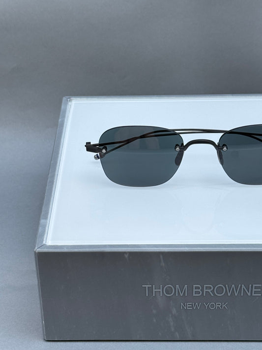 RECTANGULAR RIMLESS SUNGLASSES IN TITANIUM