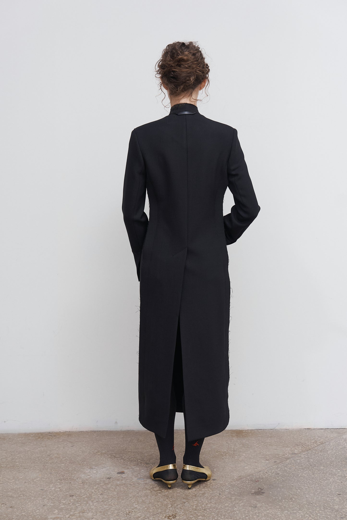 SCULPTED ASYMMETRIC WOOL COAT