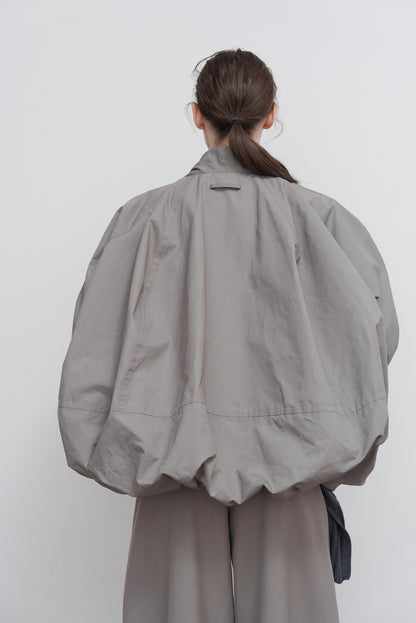 VOLUMINOUS BOMBER WITH DRAWSTRING
