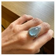 PEAR-SHAPED AQUAMARINE CABOCHON RIGH WITH DOUBLE DIAMOND HALO