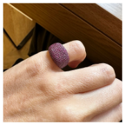 WIDE DOMED RIGN FULLY PAVE-SET WITH RUBIES