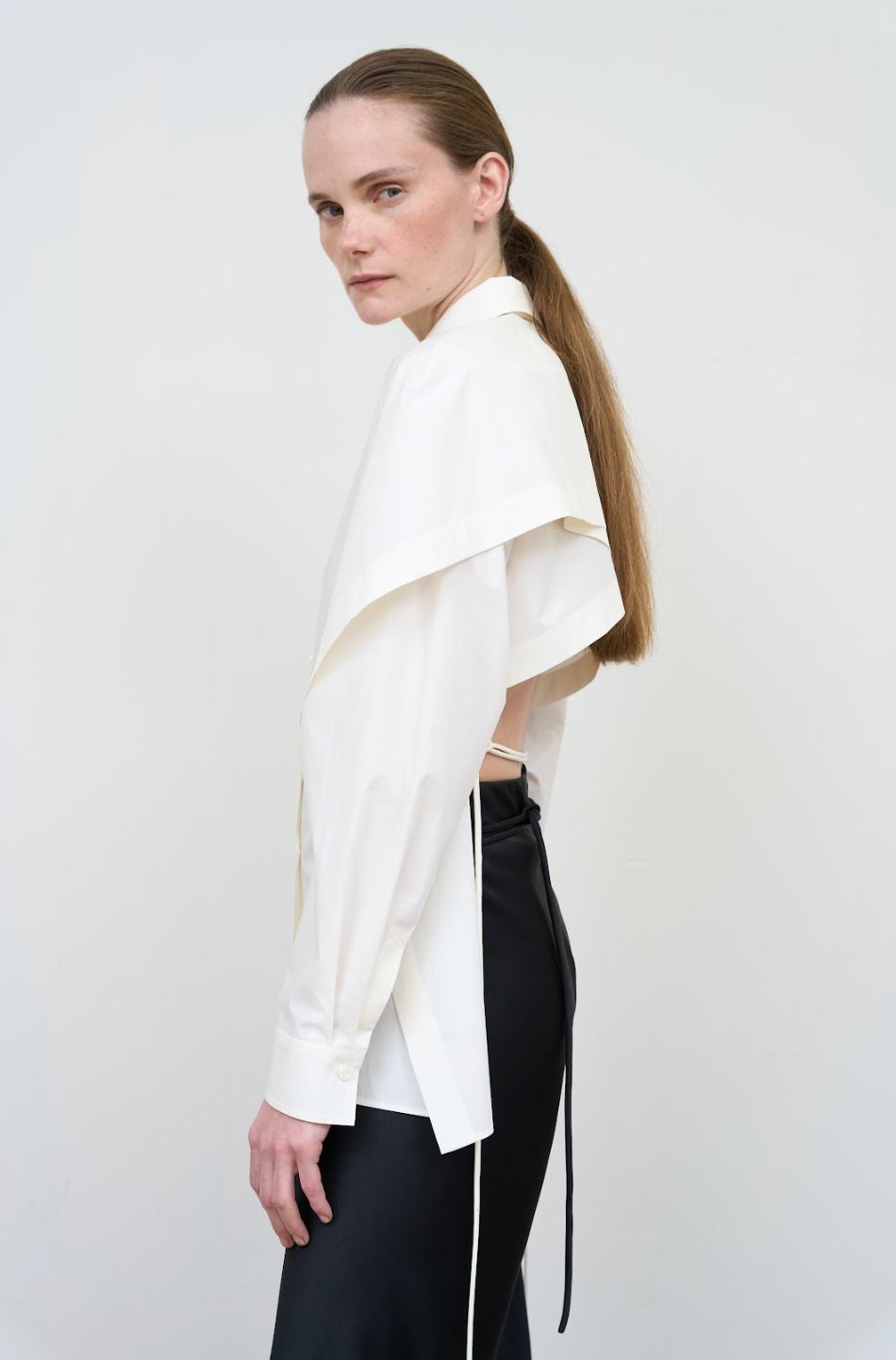 FITTED SHIRT WITH CAPELET OVERLAY