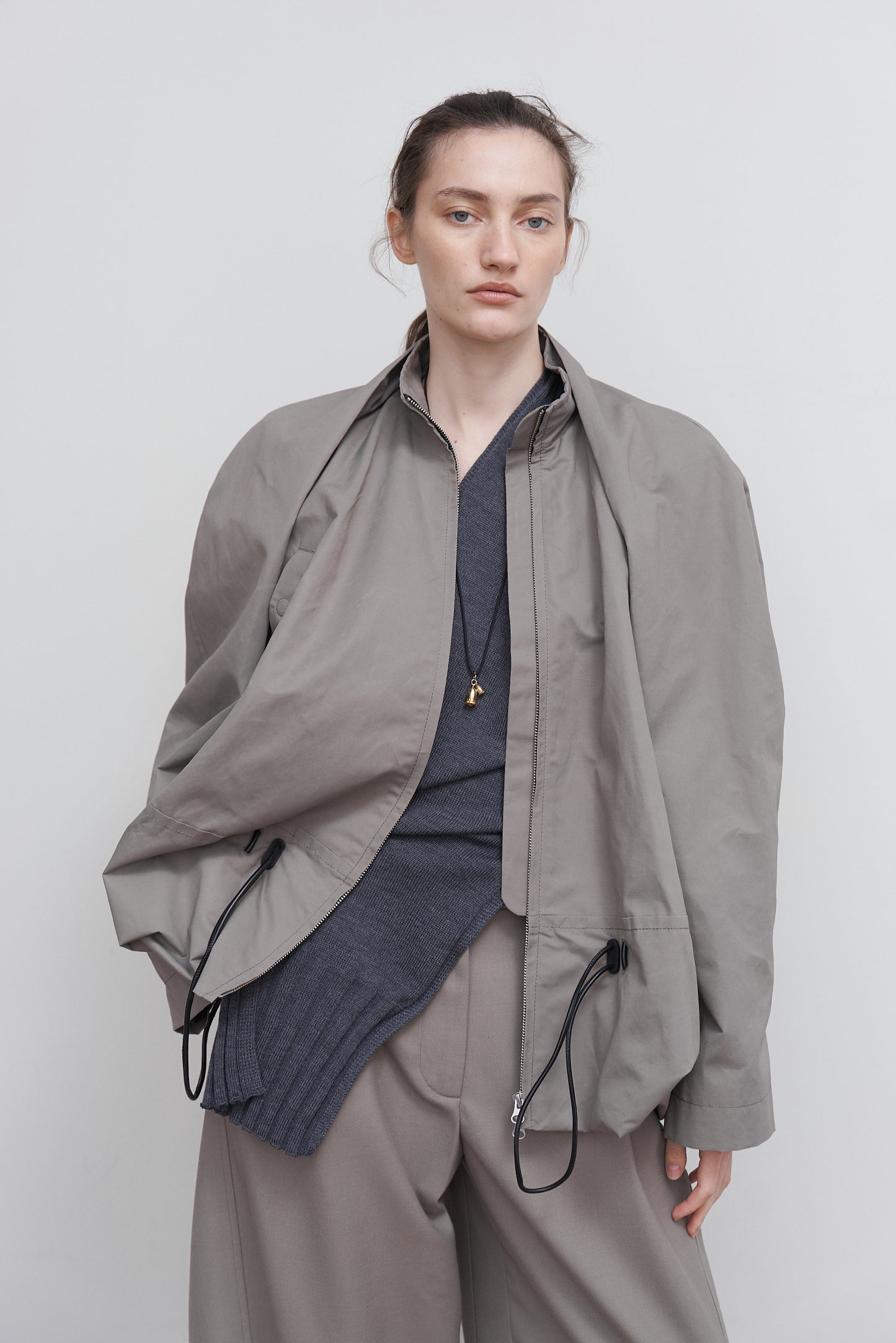 VOLUMINOUS BOMBER WITH DRAWSTRING