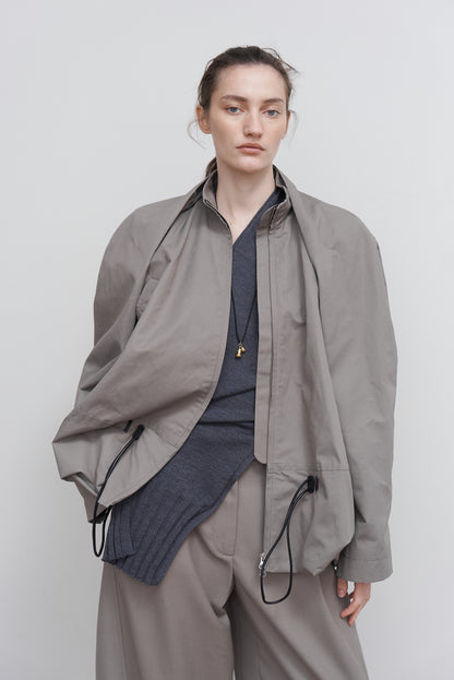 VOLUMINOUS BOMBER WITH DRAWSTRING