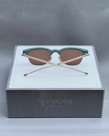 OVAL SUNGLASSES IN ACETATE AND TITANIUM WITH BROWN LENSES
