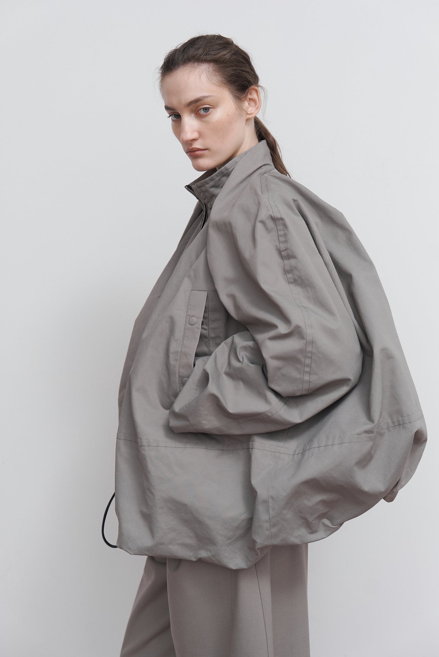 VOLUMINOUS BOMBER WITH DRAWSTRING