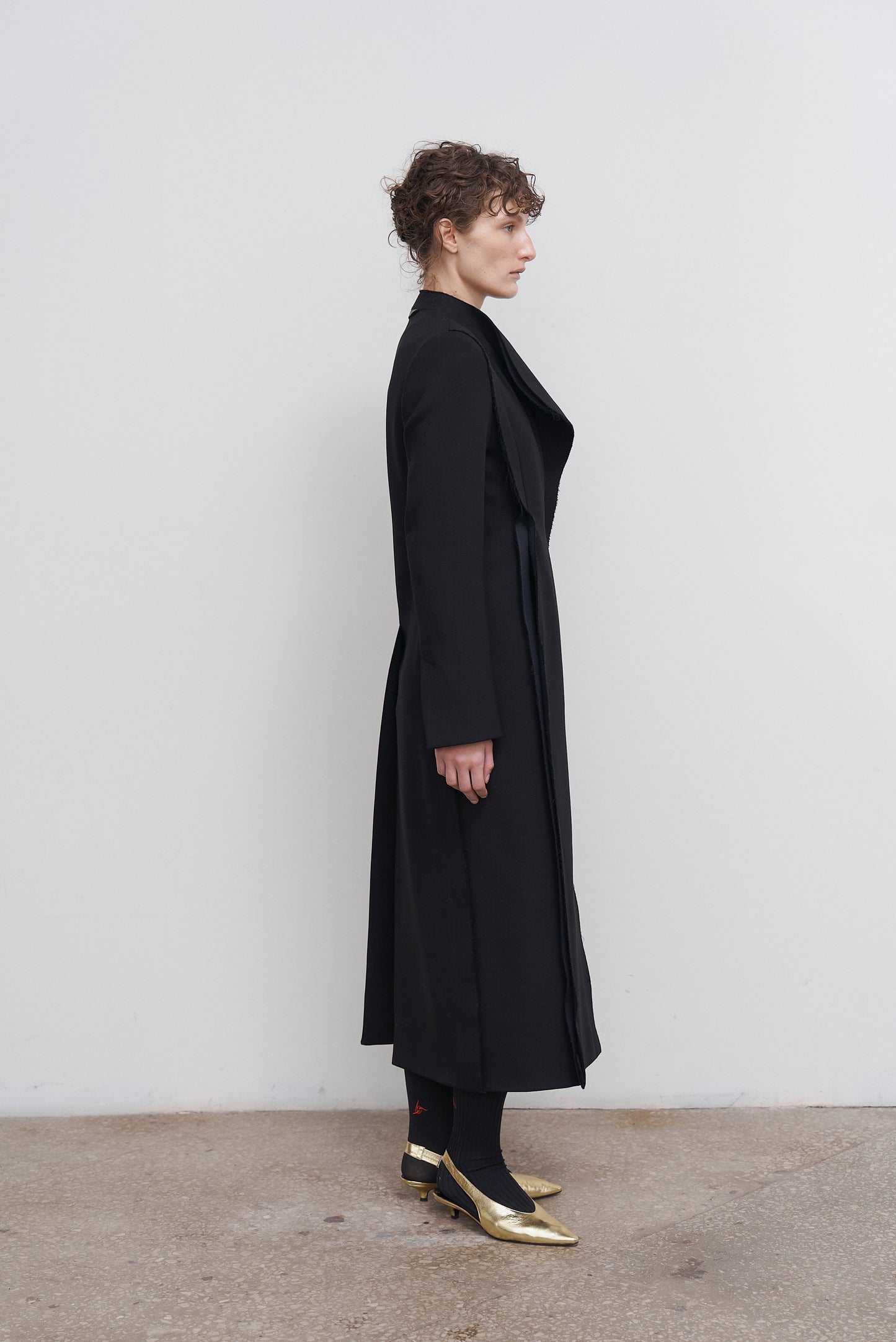 SCULPTED ASYMMETRIC WOOL COAT
