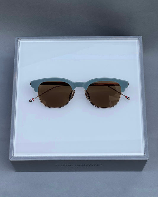 OVAL SUNGLASSES IN ACETATE AND TITANIUM WITH BROWN LENSES