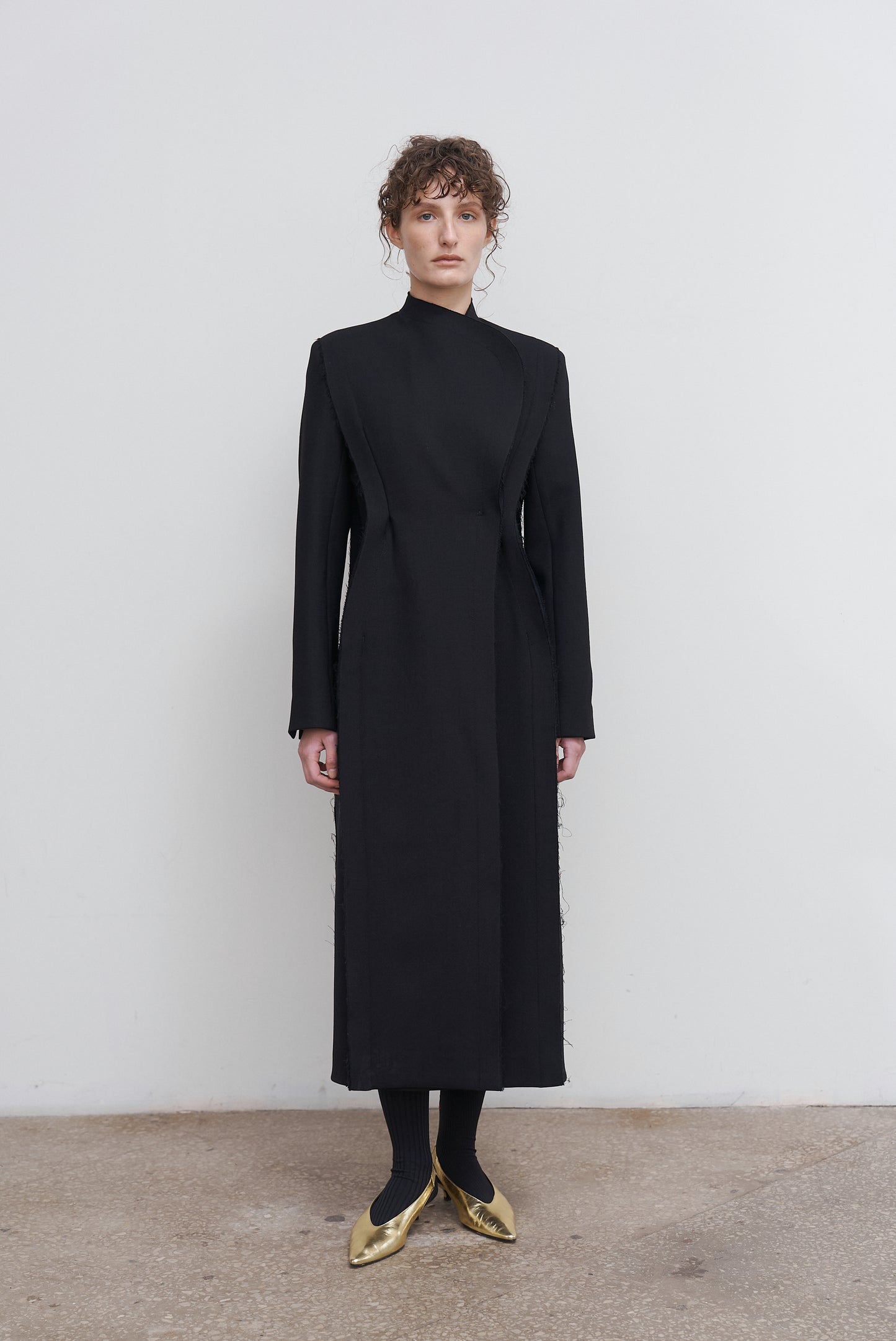 SCULPTED ASYMMETRIC WOOL COAT