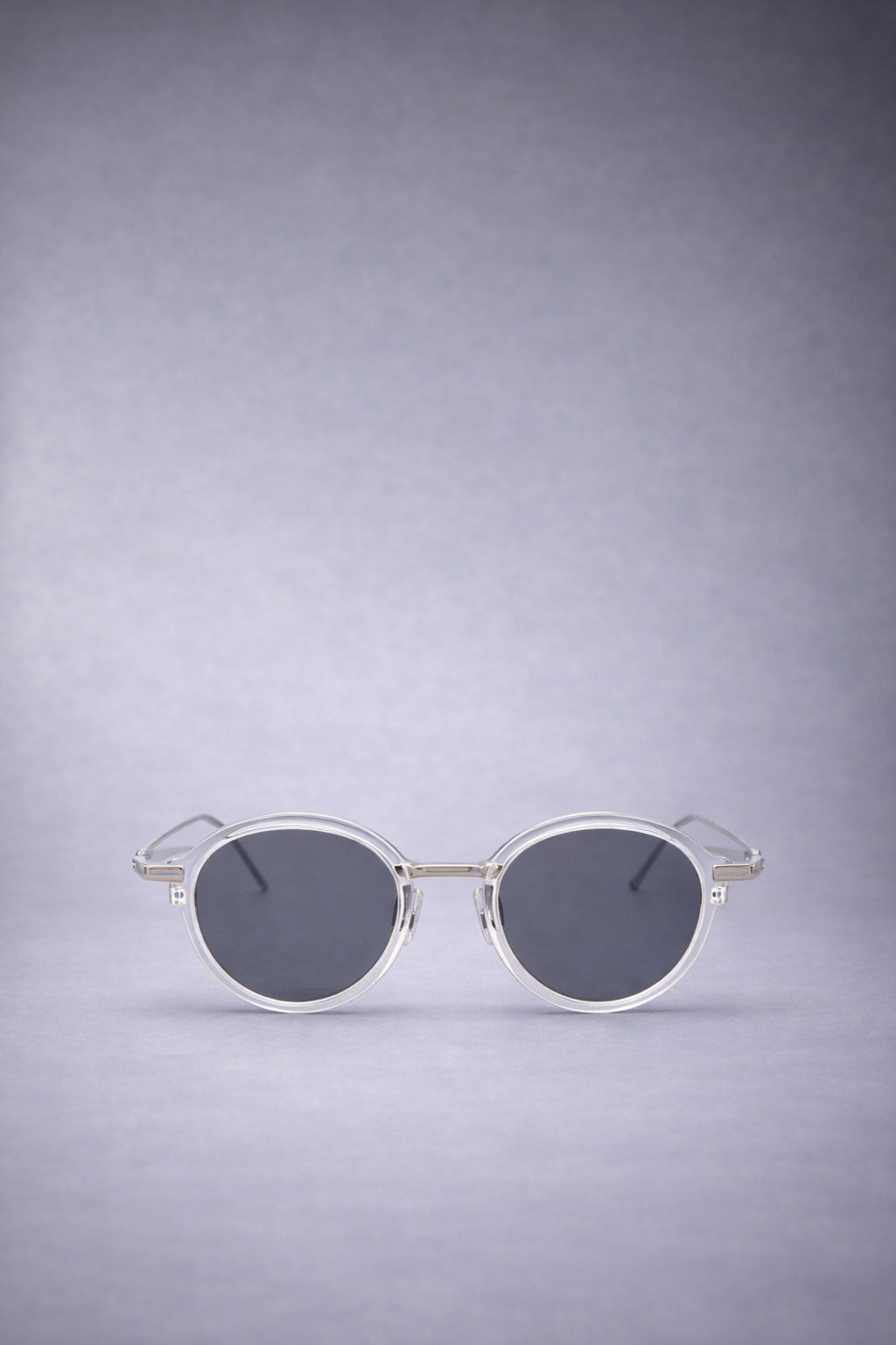 ROUND SUNGLASSES IN ACETATE AND TITANIUM CLEAR