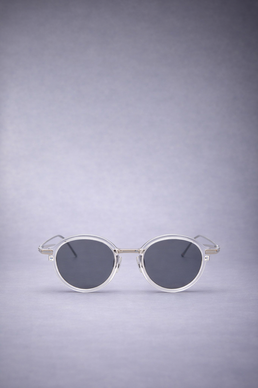 ROUND SUNGLASSES IN ACETATE AND TITANIUM CLEAR