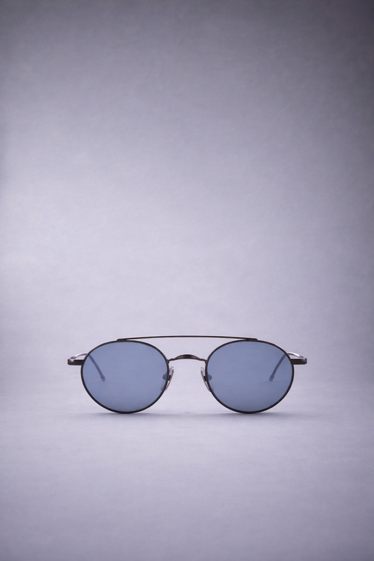 OVAL SUNGLASSES IN TITANIUM BLACK