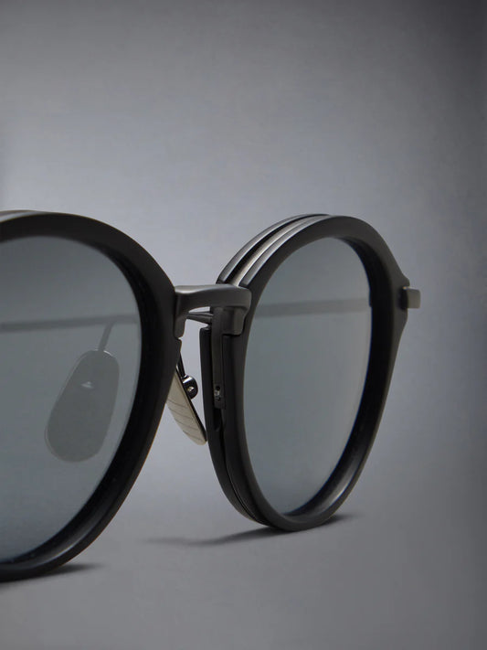 ROUND SUNGLASSES IN ACETATE AND TITANIUM BLACK