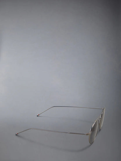 OVAL SUNGLASSES IN TITANIUM GREY