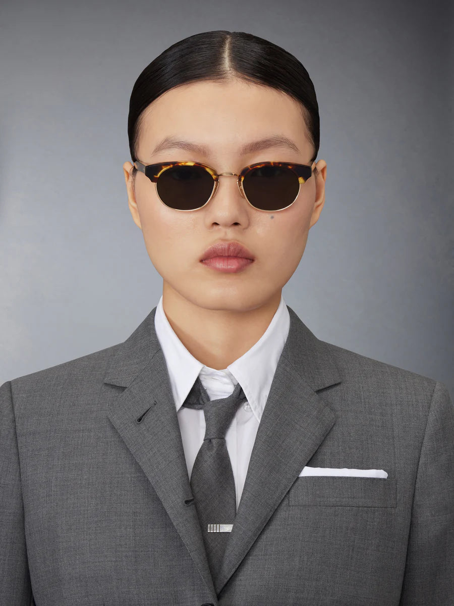 OVAL SUNGLASSES IN ACETATE AND TITANIUM GOLD