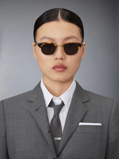 OVAL SUNGLASSES IN ACETATE AND TITANIUM GOLD