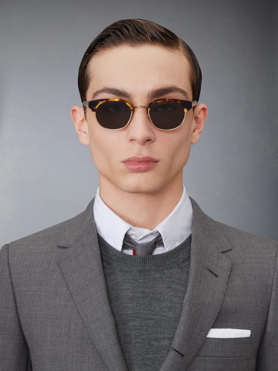 OVAL SUNGLASSES IN ACETATE AND TITANIUM GOLD