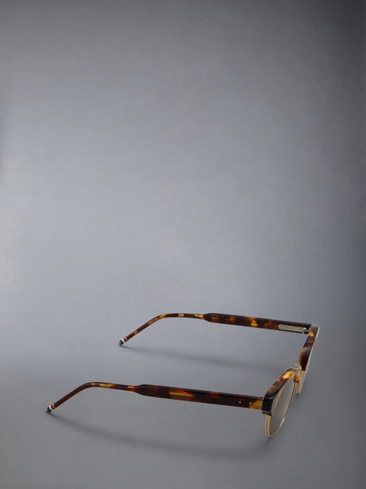 OVAL SUNGLASSES IN ACETATE AND TITANIUM GOLD
