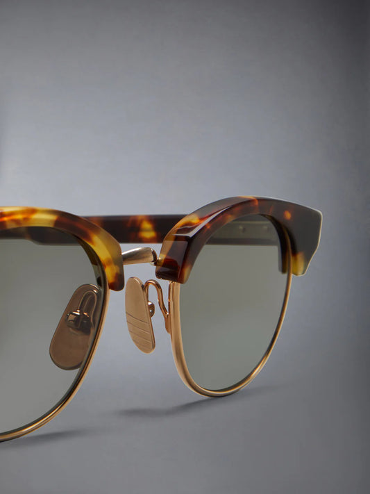 OVAL SUNGLASSES IN ACETATE AND TITANIUM GOLD
