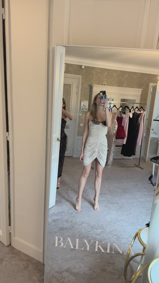 BEIGE ANGLED MINI DRESS WITH A CUT